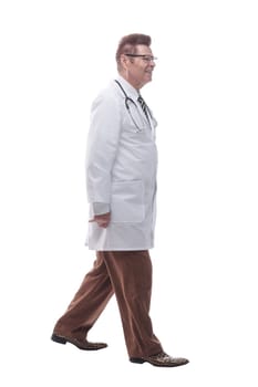 in full growth. a confident therapist, stepping forward. isolated on a white background