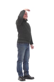 Positive young businessman peers into the future, concept for progress, development and career. Isolated over white