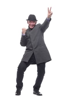 emotional man in a hat and autumn coat . isolated on a white background.
