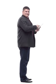 side view. Mature business man with a digital tablet. isolated on a white background.