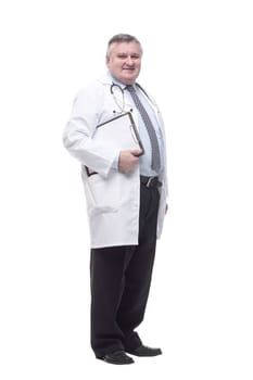 in full growth.competent doctor with clipboard. isolated on a white background.