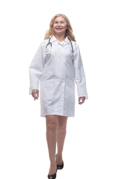 full length . successful woman doctor stepping forward . isolated on white background.