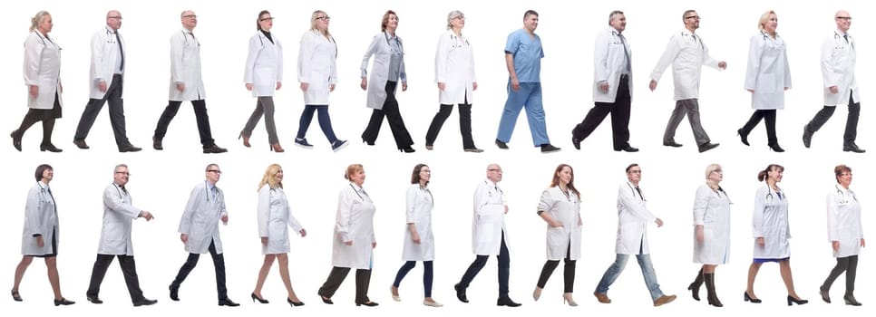 group of doctors in motion isolated on white background