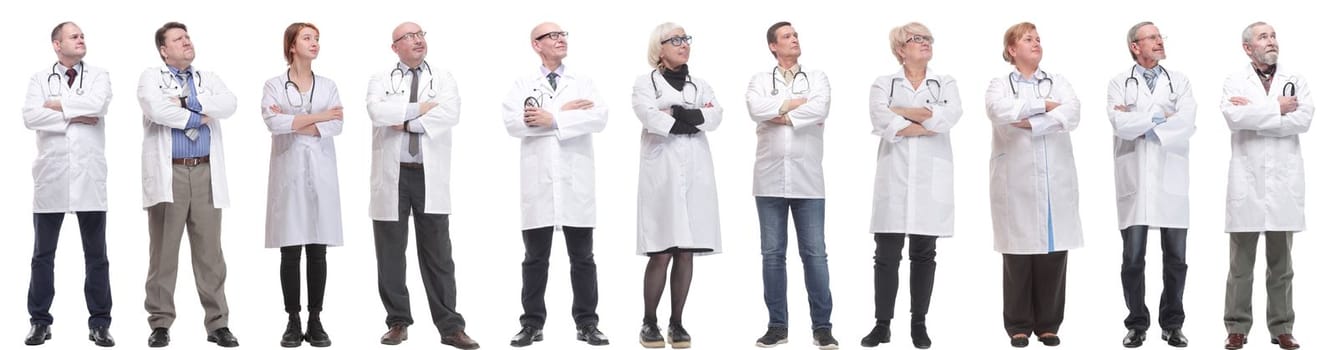 group of doctors standing in full length isolated on white background