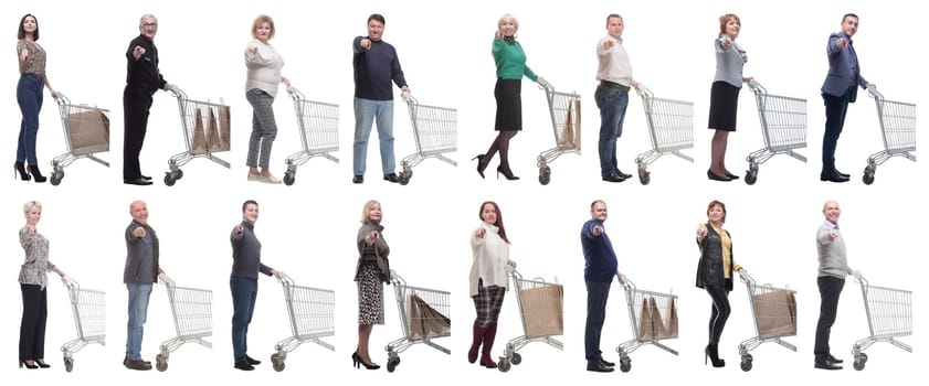 a group of people with a shopping cart point their finger at the camera on a white background