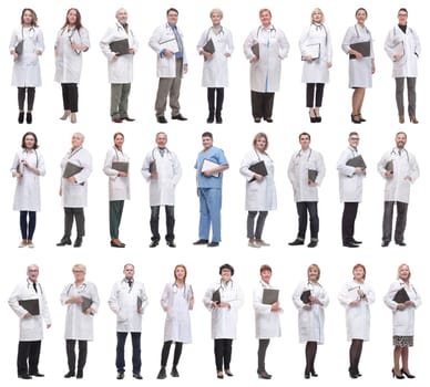 full length group of doctors with notepad isolated on white background