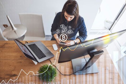 Professional businesswoman working at her office via laptop, young female manager using computer device while sitting at modern loft, computer graphics, work process concept. High quality photo