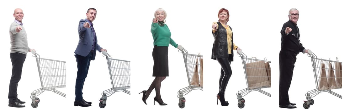 a group of people with a shopping cart point their finger at the camera on a white background