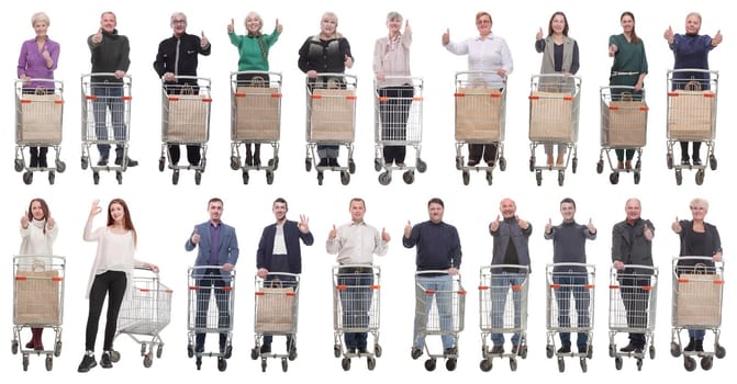 group of people with shopping cart showing thumbs up isolated on white background