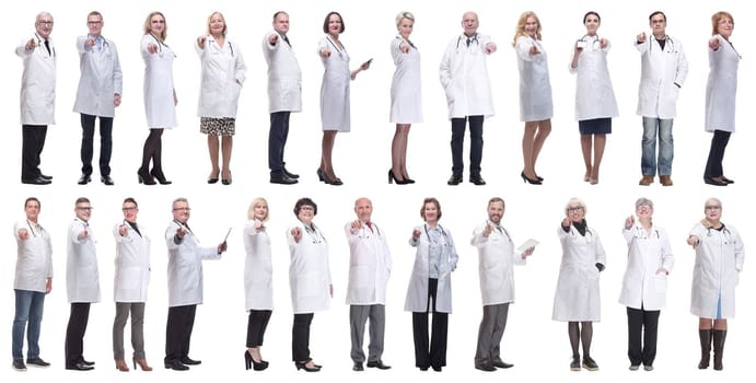 group of doctors in full length isolated on white background