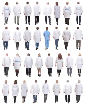 group of doctors in motion isolated on white background