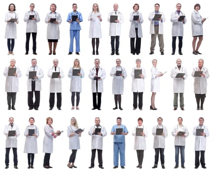group of doctors in full length isolated on white background