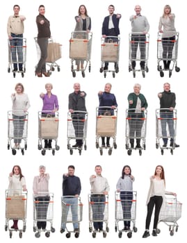 group of people with shopping cart showing thumbs up at camera isolated on white background