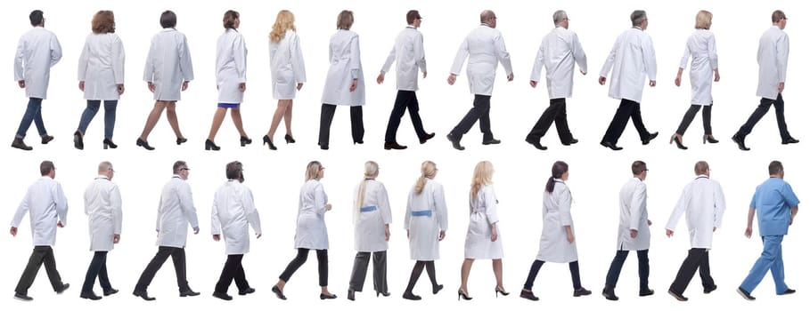 group of doctors in motion isolated on white background