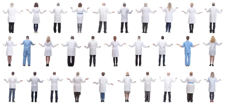 group of doctors standing with their backs isolated on white background