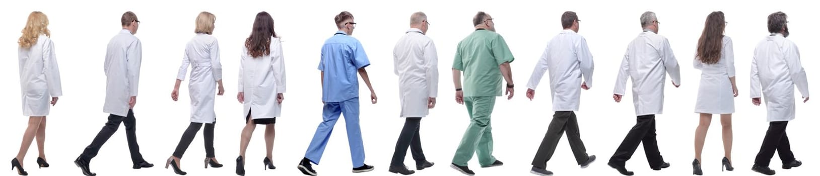 group of doctors in motion isolated on white background