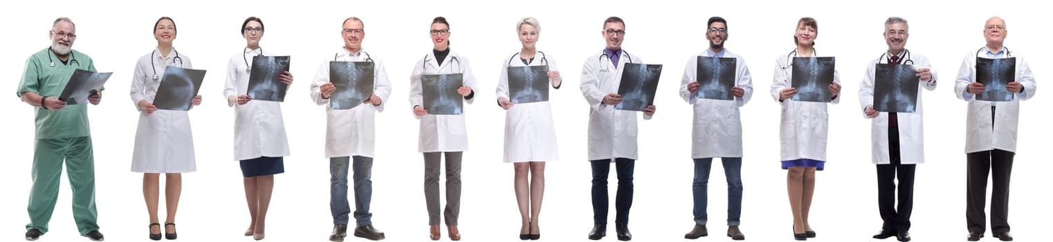group of doctors holding x-ray isolated on white background