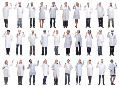 group of doctors in full length isolated on white background
