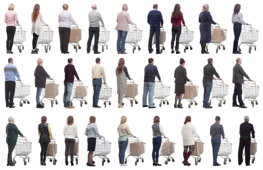 a group of people with a cart stand with their backs isolated on a white background