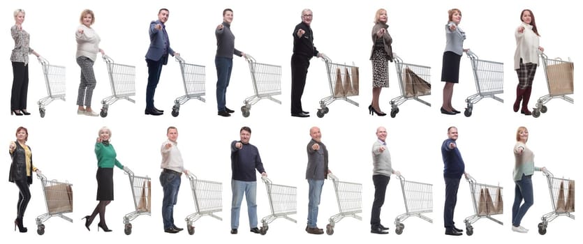 a group of people with a shopping cart point their finger at the camera on a white background