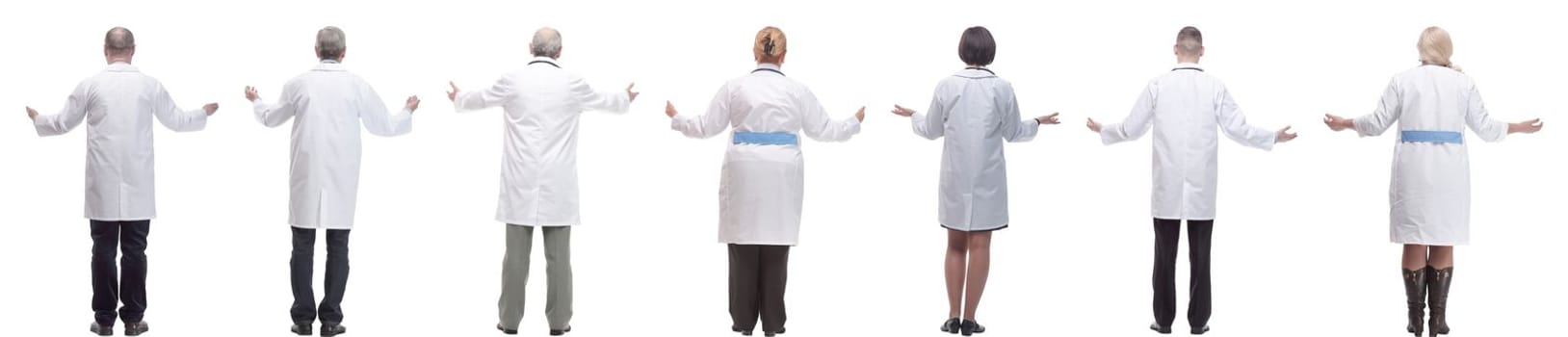 group of doctors standing with their backs isolated on white background