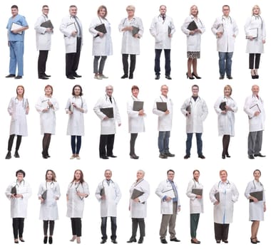 full length group of doctors with notepad isolated on white background