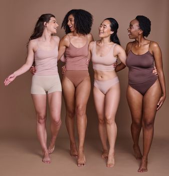 Women diversity, body positivity and happy hug of a group of model friends smile about skin beauty. Wellness, solidarity and proud woman community celebrate skincare, natural cosmetics and health.