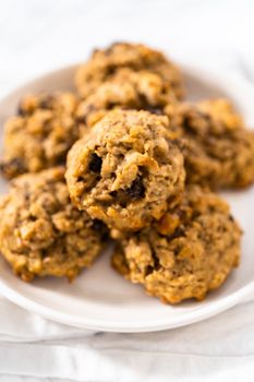 Freshly baked soft oatmeal raisin walnut cookies.