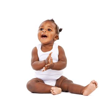Thats fantastic. Studio shot of a happy baby girl isolated on white