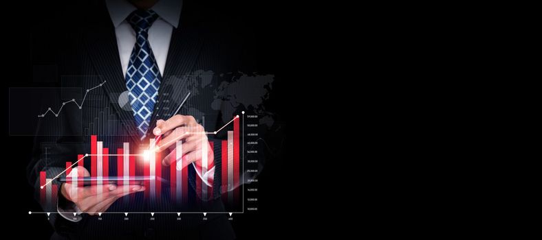 Businessman analyst working with digital finance business data graph showing technology of investment strategy for perceptive financial business decision. Digital economic analysis technology concept.