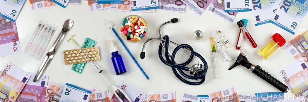 stethoscope and the euro banknotes, Medical cost concept - dental care, , broken glasses,hearing aids