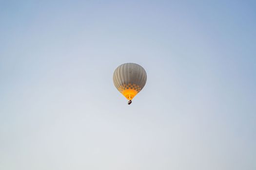 Beautiful hot air balloons over blue sky.