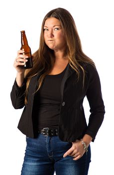 Isolated portrait of a forty year old woman in a sport coat holding a brown beer bottle, with a mouth full of beer
