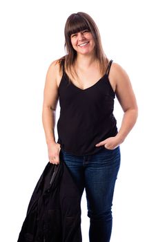 Isolated portrait of a forty year old woman, wearing a black tank top, holding a biker coat