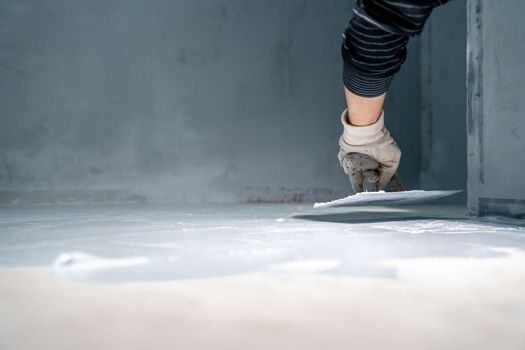 waterproofing of the bathroom floor in a new building.