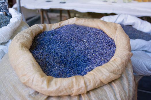 Bags of whole grain dry lavender at a market in Provence France