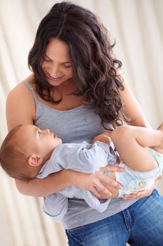 You mean the world to me. a beautiful young woman and her baby at home