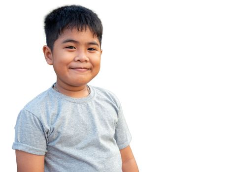 Portrait of smiling boy isolated on white background