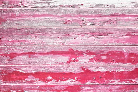 Painted red old wooden wall texture, rustic background.
Peeling paint wood background.