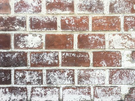 Red color brick wall. Old rough stone on cement pattern wall background. Vintage grunge wall.