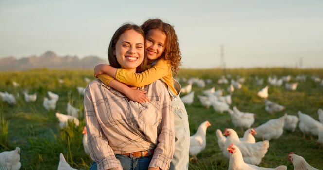 Hug, child and mother on a farm with chicken on mothers day, travel or holiday in Argentina together. Happy, portrait and kiss from girl with her mama on a field with animals during vacation.