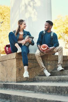 Students, relax and friends in college park for study, education and happy learning. University, woman with books and african sports man or university student together summer outdoor for happiness.