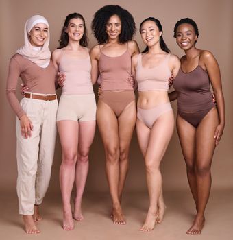 Women, studio beauty and diversity in global community, support and self love, wellness and healthy skincare. Portrait, female group and models for body positive, solidarity and international culture.