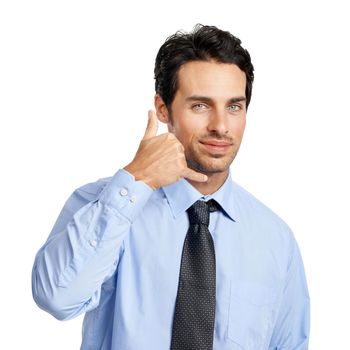 Businessman, studio portrait and call me hand sign with confidence, isolated by backdrop. Corporate executive man, financial advisor or phone hands for finance communication by white background.