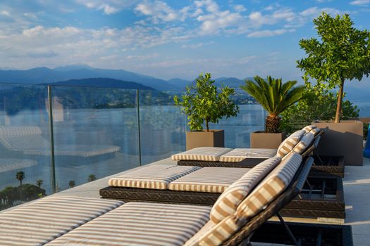 Sun loungers overlooking Lake Maggiore in Italy View from above