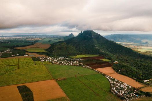 Bird's eye view of beautiful fields Islands of Mauritius and mountains.