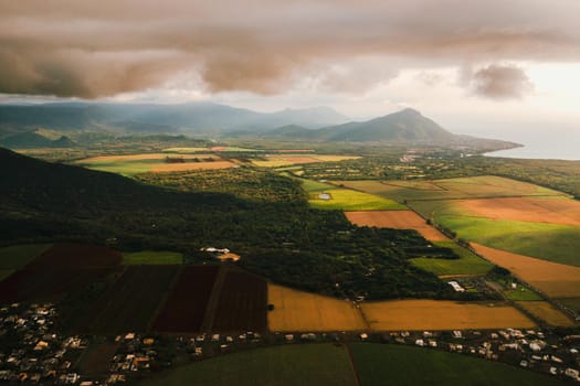 Bird's eye view of beautiful fields Islands of Mauritius and mountains.