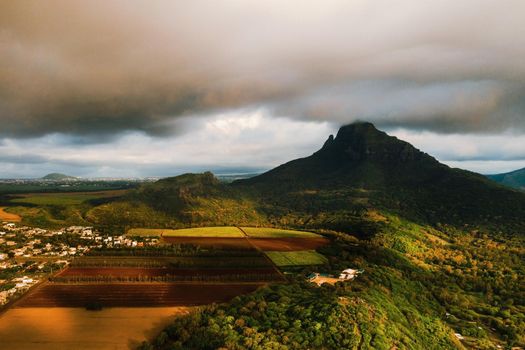 Bird's eye view of beautiful fields Islands of Mauritius and mountains.