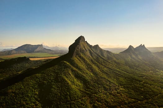 Aerial view of mountains and fields in Mauritius island.