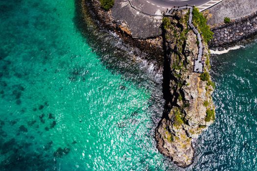 Maconde view point.Monument to captain Matthew Flinders in Mauritius. An unusual road to the Islands of Mauritius. Coral reef in the Indian ocean.